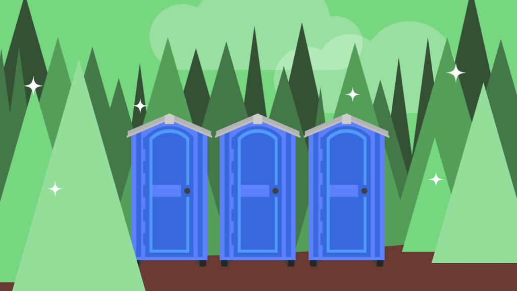 row of portable toilets outdoors